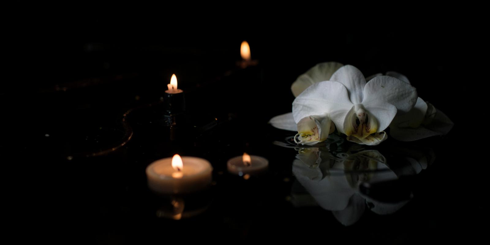 Candles floating in water